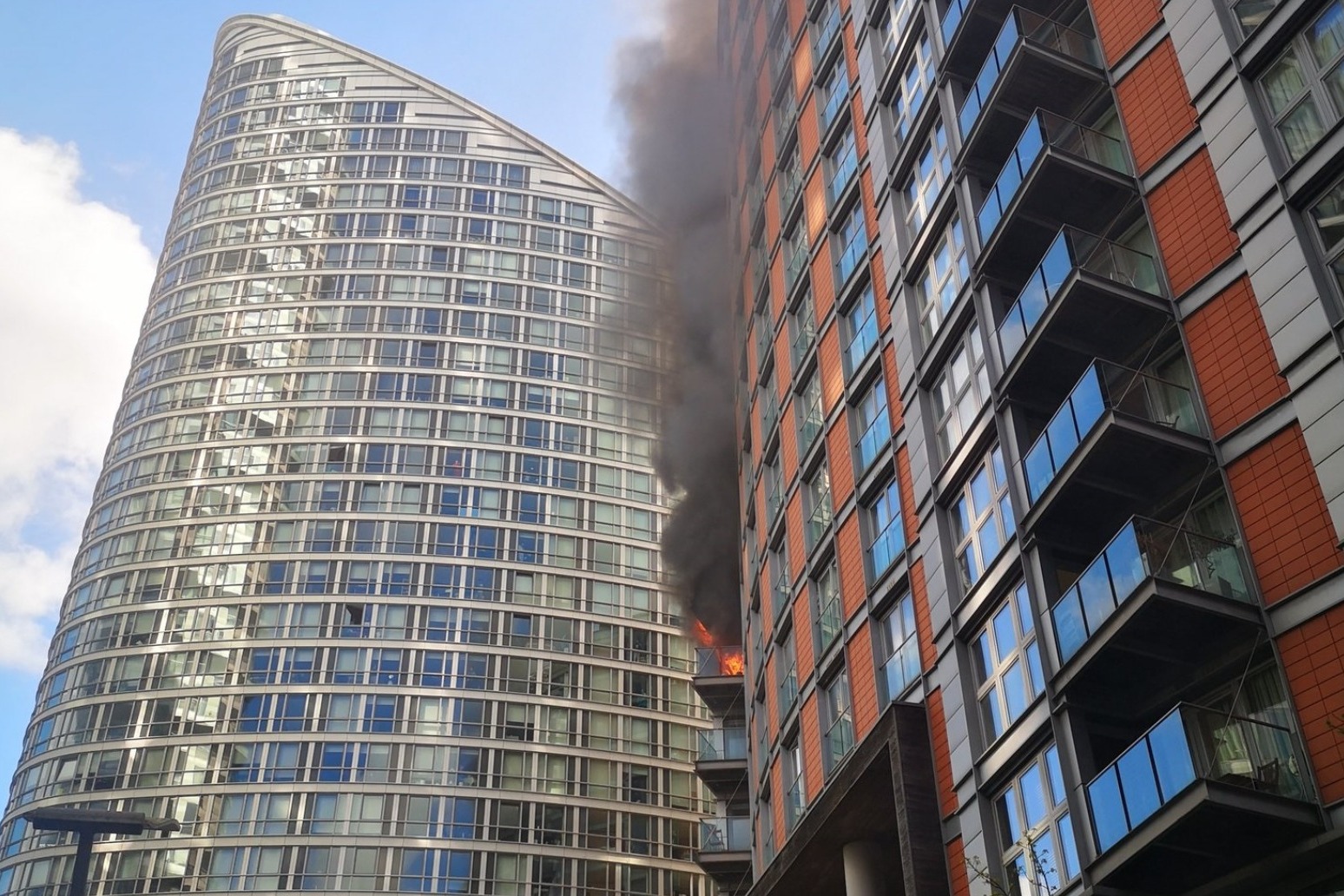Blaze engulfs several floors of tower block near Canary Wharf 